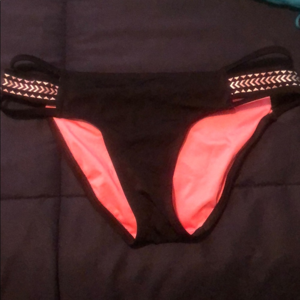 Pink Victoria’s Secret swimming suit bottoms